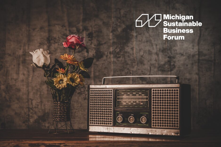 Still life with a retro radio receiver and flower vases.